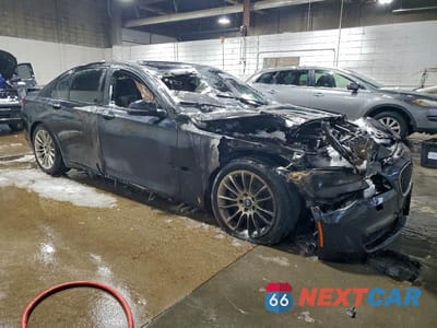 Czwarte zdjęcie samochodu z boku: 2014 BMW 750 XI VIN:WBAYB6C58ED224864 - miniatura