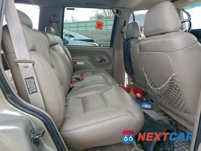 Zdjęcie 10 z 12 samochodu: 1999 CHEVROLET TAHOE K1500 VIN:1GNEK13R4XJ460340 - miniatura