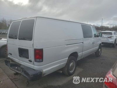 Trzecie zdjęcie samochodu z tyłu: 2001 FORD ECONOLINE E350 SUPER DUTY VAN VIN:1FTSS34L61HA50073 - miniatura