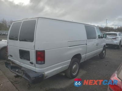 Trzecie zdjęcie samochodu z tyłu: 2001 FORD ECONOLINE E350 SUPER DUTY VAN VIN:1FTSS34L61HA50073 - miniatura