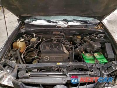 Zdjęcie 12 z 13 samochodu: 2004 MAZDA TRIBUTE LX VIN:4F2YZ94154KM08990 - miniatura