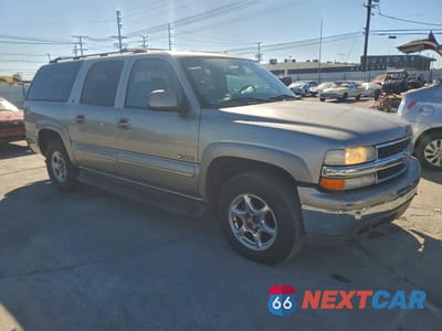 Czwarte zdjęcie samochodu z boku: 2001 CHEV SUBURBAN VIN:3GNEC16T31G128368 - miniatura