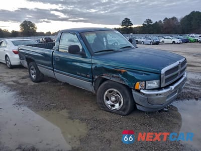 Czwarte zdjęcie samochodu z boku: 1999 DODGE RAM 1500 VIN:1B7HC16ZXXS265190 - miniatura