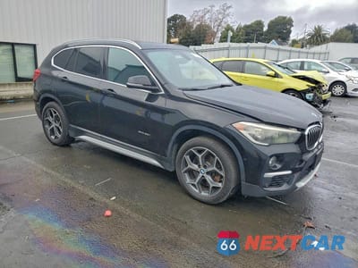 Czwarte zdjęcie samochodu z boku: 2016 BMW X1 XDRIVE28I VIN:WBXHT3C37G5F67018 - miniatura