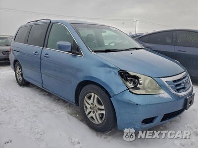 Czwarte zdjęcie samochodu z boku: 2010 HONDA ODYSSEY EXL VIN:5FNRL3H74AB045494 - miniatura