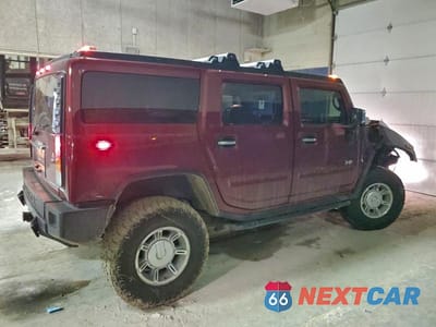 Trzecie zdjęcie samochodu z tyłu: 2003 HUMMER H2 VIN:5GRGN23U23H144695 - miniatura