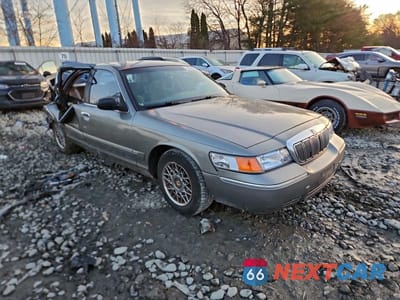 Czwarte zdjęcie samochodu z boku: 2002 MERCURY GRAND MARQUIS GS VIN:2MEFM74W42X650412 - miniatura