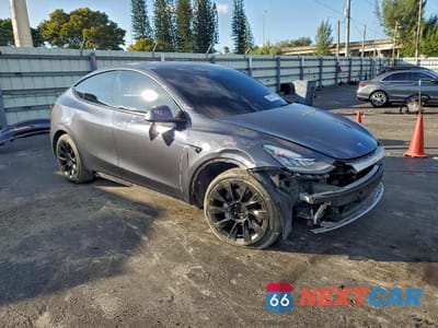Czwarte zdjęcie samochodu z boku: 2021 TESLA MODEL Y VIN:5YJYGDEE8MF230726 - miniatura