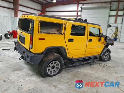 Trzecie zdjęcie samochodu z tyłu: 2003 HUMMER H2 VIN:5GRGN23UX3H144072 - miniatura