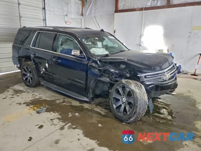 Czwarte zdjęcie samochodu z boku: 2015 CHEVROLET TAHOE K1500 LTZ VIN:1GNSKCKC2FR647524 - miniatura