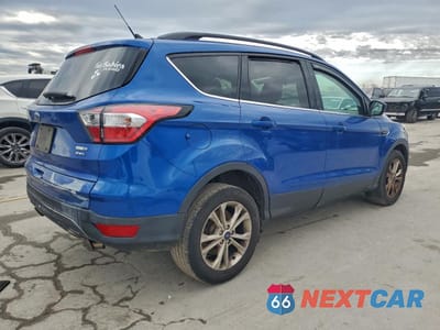 Trzecie zdjęcie samochodu z tyłu: 2018 FORD ESCAPE SEL VIN:1FMCU9HD9JUC99121 - miniatura