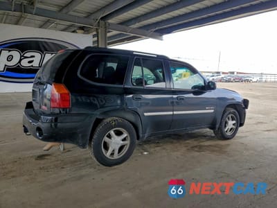 Trzecie zdjęcie samochodu z tyłu: 2006 GMC ENVOY VIN:1GKDS13S362332224 - miniatura