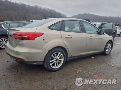 Trzecie zdjęcie samochodu z tyłu: 2016 FORD FOCUS SE VIN:1FADP3F23GL251021 - miniatura