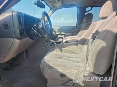 Zdjęcie 7 z 15 samochodu: 2004 CHEVROLET TAHOE C1500 VIN:1GNEC13T14J245678 - miniatura