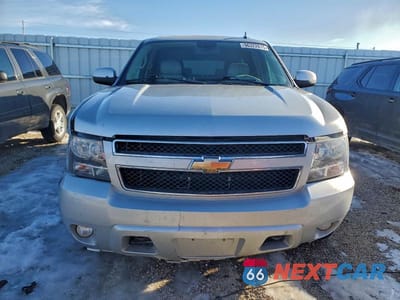 Piąte zdjęcie samochodu w środku: 2011 CHEVROLET SUBURBAN K1500 LT VIN:1GNSKJE35BR306810 - miniatura