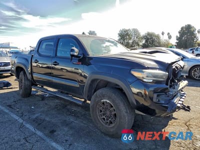 Czwarte zdjęcie samochodu z boku: 2021 TOYOTA TACOMA DOUBLE CAB VIN:5TFCZ5AN5MX251944 - miniatura