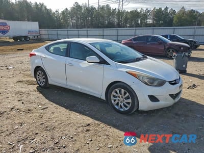Czwarte zdjęcie samochodu z boku: 2012 HYUNDAI ELANTRA GLS VIN:5NPDH4AE4CH127451 - miniatura