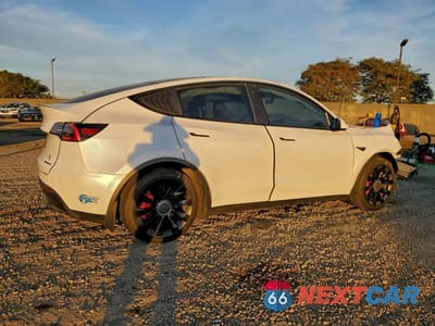 Trzecie zdjęcie samochodu z tyłu: 2021 TESLA MODEL Y VIN:5YJYGDED1MF125923 - miniatura