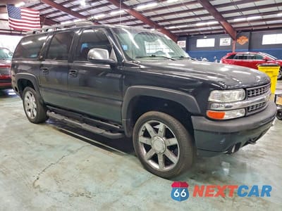 Czwarte zdjęcie samochodu z boku: 2004 CHEVROLET SUBURBAN K1500 VIN:3GNFK16T64G138601 - miniatura