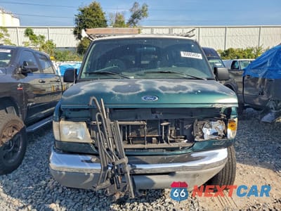 Piąte zdjęcie samochodu w środku: 1999 FORD ECONOLINE E350 SUPER DUTY WAGON VIN:1FMNE31F5XHA43817 - miniatura
