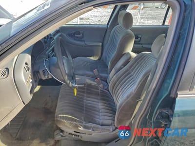 Zdjęcie 7 z 14 samochodu: 1998 CHEVROLET LUMINA BASE VIN:2G1WL52M9W1130475 - miniatura