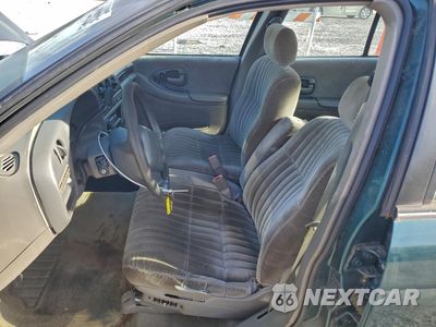 Zdjęcie 7 z 14 samochodu: 1998 CHEVROLET LUMINA BASE VIN:2G1WL52M9W1130475 - miniatura