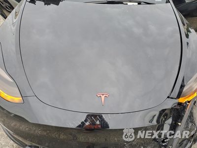 Zdjęcie 11 z 12 samochodu: 2023 TESLA MODEL Y VIN:7SAYGDEE6PA116633 - miniatura