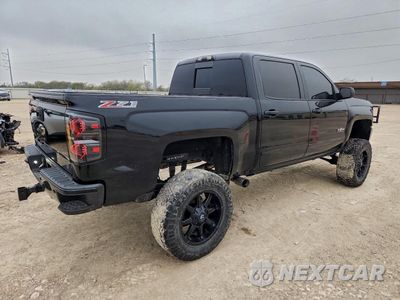 Trzecie zdjęcie samochodu z tyłu: 2017 CHEVROLET SILVERADO K1500 LT VIN:3GCUKREC8HG478161 - miniatura