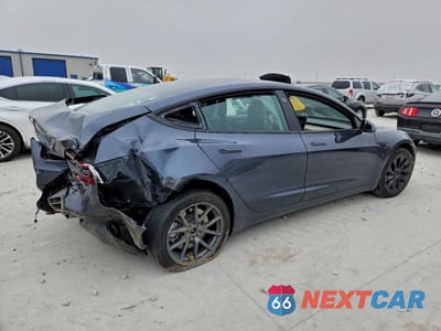 Trzecie zdjęcie samochodu z tyłu: 2022 TESLA MODEL 3 VIN:5YJ3E1EB5NF164822 - miniatura