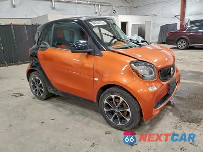 Czwarte zdjęcie samochodu z boku: 2016 SMART FORTWO VIN:WMEFJ5DA9GK080065 - miniatura