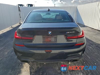 Zdjęcie 6 z 11 samochodu: 2021 BMW M340I VIN:3MW5U7J04M8B51997 - miniatura