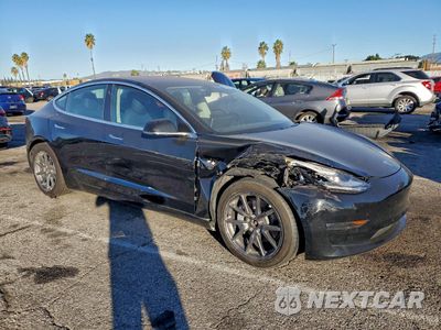 Czwarte zdjęcie samochodu z boku: 2018 TESLA MODEL 3 VIN:5YJ3E1EB3JF183668 - miniatura