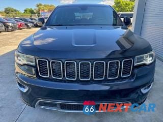 Piąte zdjęcie samochodu w środku: 2021 JEEP GRAND CHEROKEE LAREDO VIN:1C4RJEAGXMC657311 - miniatura