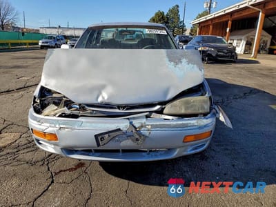 Piąte zdjęcie samochodu w środku: 1995 TOYOTA CAMRY LE VIN:4T1GK12E3SU077833 - miniatura