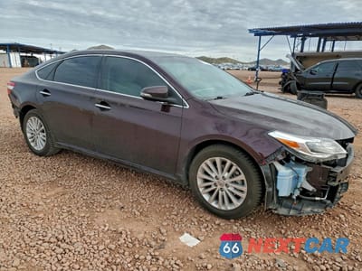 Czwarte zdjęcie samochodu z boku: 2014 TOYOTA AVALON HYBRID VIN:4T1BD1EB7EU030024 - miniatura