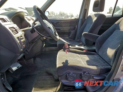 Zdjęcie 7 z 15 samochodu: 1999 HONDA CR-V LX VIN:JHLRD1847XC063777 - miniatura