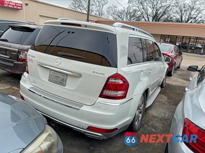 Czwarte zdjęcie samochodu z boku: 2010 MERCEDES-BENZ GL 450 4MATIC VIN:4JGBF7BB9AA532496 - miniatura