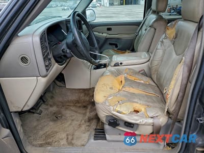 Zdjęcie 7 z 15 samochodu: 2001 GMC YUKON VIN:1GKEC13T11J129101 - miniatura