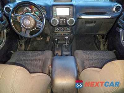 Zdjęcie 8 z 12 samochodu: 2011 JEEP WRANGLER UNLIMITED SAHARA VIN:1J4BA5H13BL603682 - miniatura