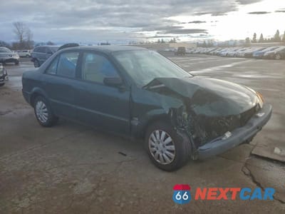 Czwarte zdjęcie samochodu z boku: 2000 MAZDA PROTEGE DX VIN:JM1BJ2225Y0218642 - miniatura