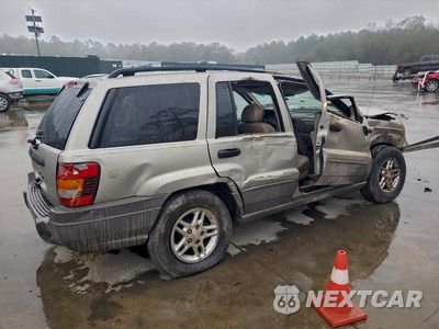 Trzecie zdjęcie samochodu z tyłu: 2003 JEEP GRAND CHEROKEE LAREDO VIN:1J4GW48SX3C567677 - miniatura