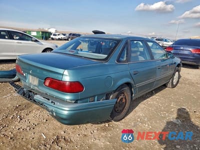 Trzecie zdjęcie samochodu z tyłu: 1993 FORD TAURUS GL VIN:1FACP52U5PG306544 - miniatura