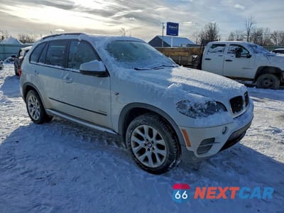 Czwarte zdjęcie samochodu z boku: 2013 BMW X5 XDRIVE35I VIN:5UXZV4C58D0B01110 - miniatura