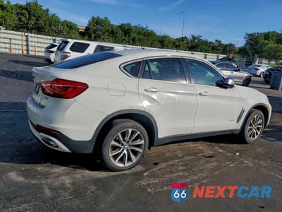 Trzecie zdjęcie samochodu z tyłu: 2019 BMW X6 50I XDRIVE XLINE VIN:5UXKU6C58KLP60670 - miniatura
