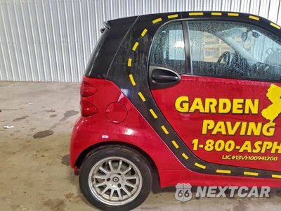 Zdjęcie 10 z 12 samochodu: 2013 SMART FORTWO PURE VIN:WMEEJ3BA7DK683806 - miniatura