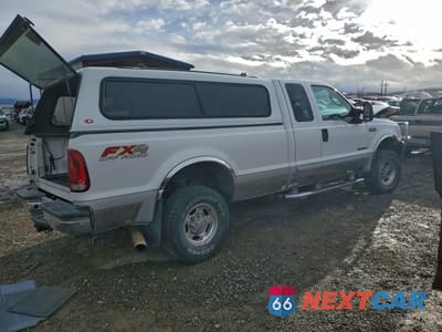 Trzecie zdjęcie samochodu z tyłu: 2003 FORD F250 SUPER DUTY VIN:1FTNX21F03EA62098 - miniatura