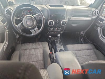 Zdjęcie 8 z 13 samochodu: 2012 JEEP WRANGLER UNLIMITED SAHARA VIN:1C4HJWEG8CL118230 - miniatura