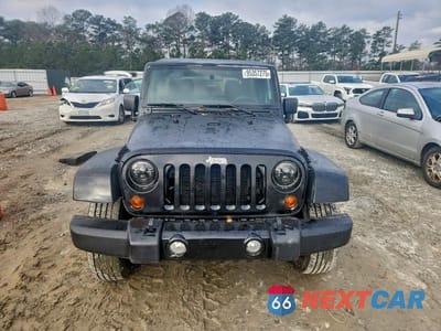 Piąte zdjęcie samochodu w środku: 2012 JEEP WRANGLER UNLIMITED SAHARA VIN:1C4HJWEG8CL118230 - miniatura