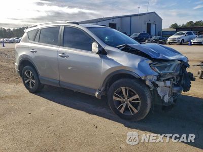 Czwarte zdjęcie samochodu z boku: 2017 TOYOTA RAV4 XLE VIN:2T3WFREV1HW370043 - miniatura