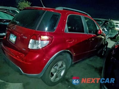 Trzecie zdjęcie samochodu z tyłu: 2012 SUZUKI SX4 VIN:JS2YB5A34C6304748 - miniatura
